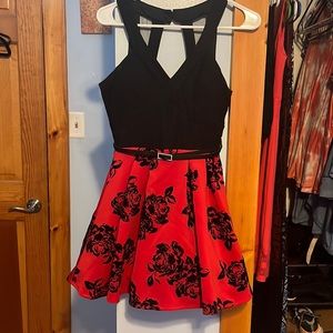 Black roses on red bottom